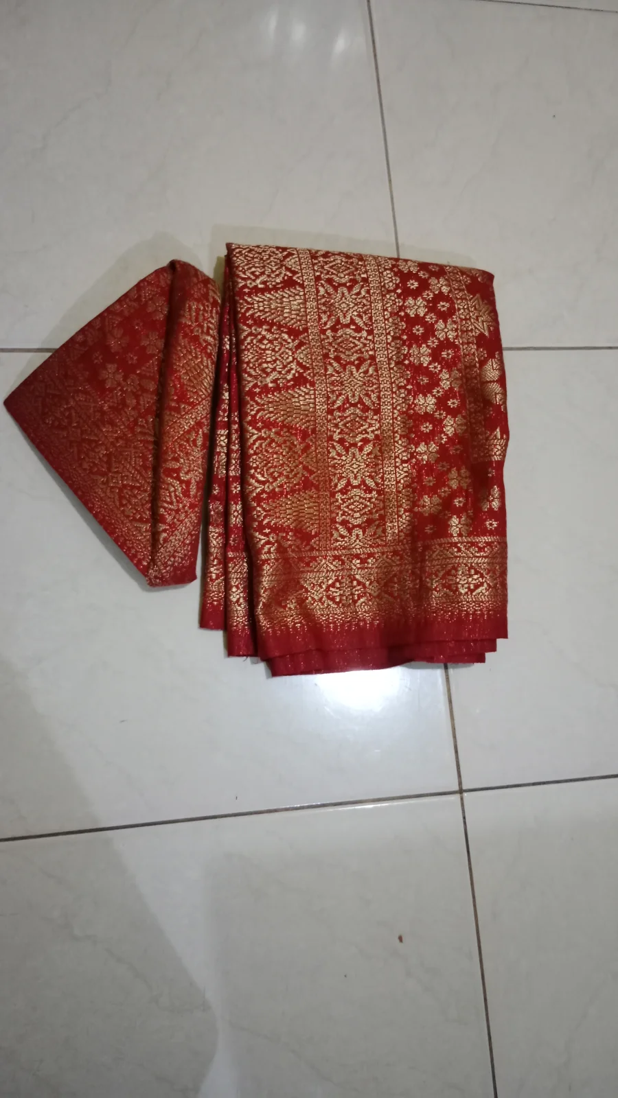 Topi dan kain Palembang